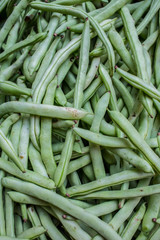 A bunch of organic green beans filling up the frame
