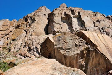 Fototapeta premium Buddhist rock drawings from 15th century at Tamgaly-Tas on Ili River near Almaty, Kazakhstan