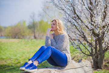 Plus size nice middle age woman rest at nature. Relax time at weekend after work. Lady lifestyle 