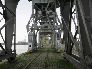 old cranes in the former harbor of Antwerpen on a cloudy day