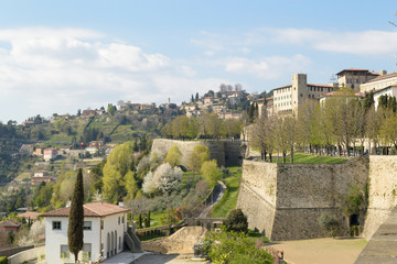 Fototapeta na wymiar The old city walls of Bergamo Alta, the upper town, recently renowed and nominated Unesco heritage site
