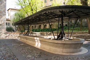 An ancient little square in Bergamo Alta the upper town, where people use to hand wash their clothes. It is a historical place with a fairy tale atmosphere remained unchanged from the past old days