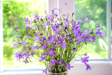 Bouquet of bells on the window