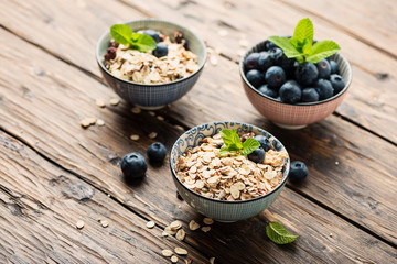 Mix of homemade cereal with blueberry and mint