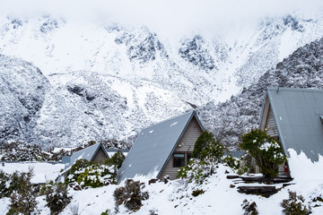View of Mount Cook Village covered with white fresh snow after a snowy day.