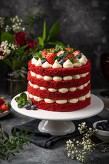 homemade layered Red Velvet cake, dark background
