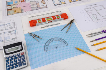 Drawing tools with house projects and millimeter paper