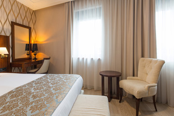 Luxury double bed hotel bedroom interior