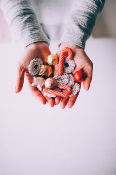 woman holding traditional christmas sweets
