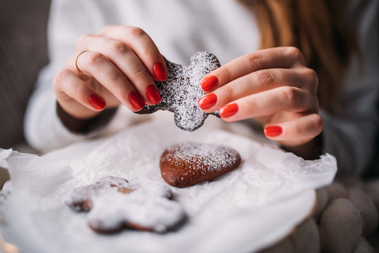woman baking ginger bread for christmas
