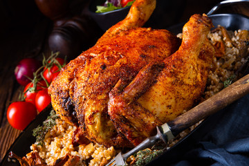 Grilled spicy chicken with barley groats and mushrooms