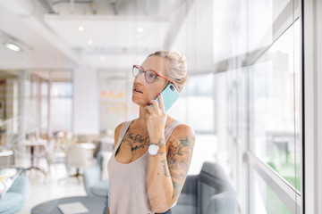 young business woman making call with smartphone