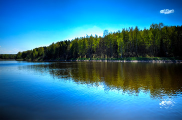 Fototapeta premium River forest horizon with dramatic reflections landscape background hd