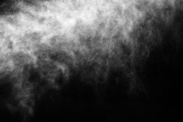 A stream of water and a cloud of drops