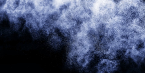 A stream of water and a cloud of drops