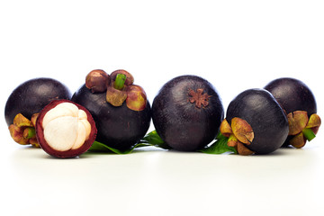 Asian tropical mangosteen fruit on white background