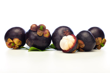 Asian tropical mangosteen fruit on white background