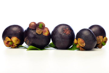 Asian tropical mangosteen fruit on white background