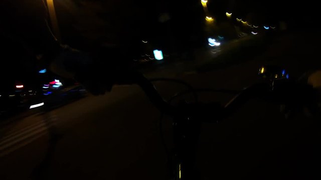 896-03 Bicycle Ride At Night Trough City Streets Handlebar View