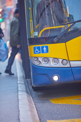 Public transportation / bus in urban surroundings on the street.