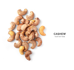 Creative layout made of cashew nuts on white background.Flat lay. Food concept.