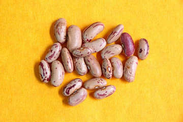 Beans on yellow background