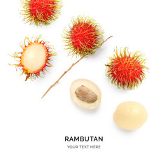 Creative layout made of rambutan on white background. Flat lay. Food concept.