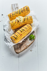 Three tasty grilled corn on the cob