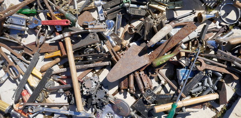 Jumble of old rusty hand tools