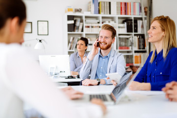 Group of business people working as team in office