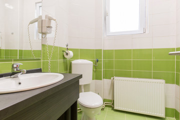 Hotel bathroom interior with shower cabin