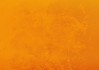 Bright grunge background of yellows and orange color. Imitation of the texture of the old wall.