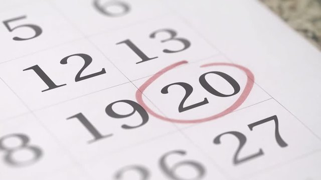 Mark on the twentieth 20 day of a month in the calendar, close-up
