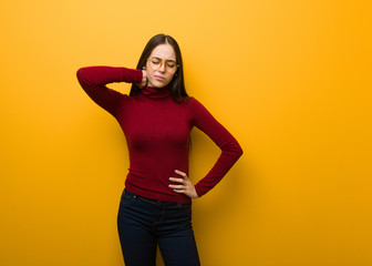 Obraz premium Intellectual young girl suffering neck pain