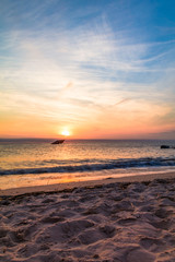 Fototapeta premium Sunset Beach and the sunken SS Atlantic at sunset in early spring with warm vivid light - Cape May Point NJ, portrait