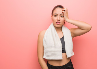 Young fitness woman worried and overwhelmed