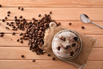 Coffee ice cream cup decorated with grains and waffle top