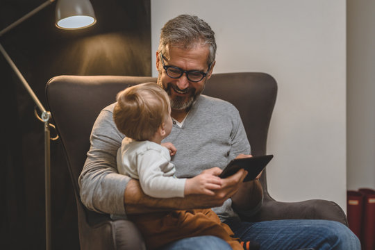 spending time with his grandson at home