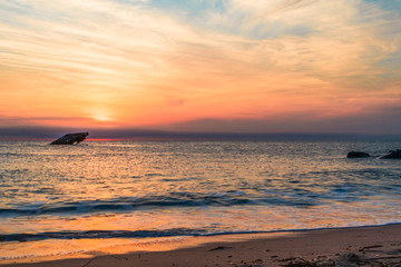Sunset Beach and the sunken SS Atlantic at sunset in early spring with warm vivid light - Cape May Point NJ
