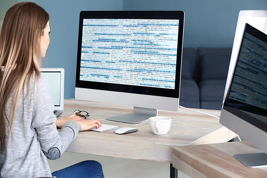 Female programmer working in office