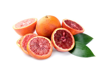 Tasty blood oranges on white background