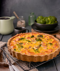 Traditional broccoli pie with salmon and cheese. Food from healthy and healthy foods. Lunch.