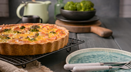 Traditional broccoli pie with salmon and cheese. Food from healthy and healthy foods. Lunch.