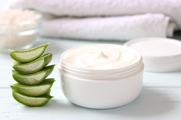 cream with aloe vera on a light background. Aloe vera skin care. Moisturizing and skin care.
