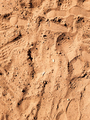 Footprints in the sand background.