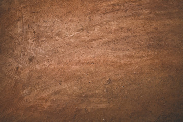 Beautiful background image of dark brown ground and pattern of wheels