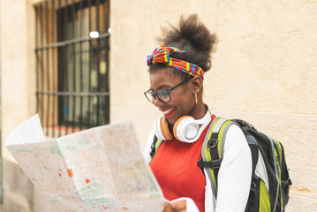 Beautiful Afro American Girl Using a Map.