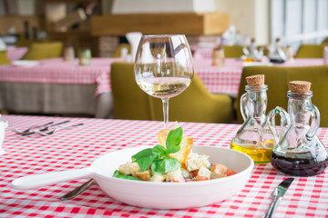 Italian cuisine, delicious vegetarian salad with croutons