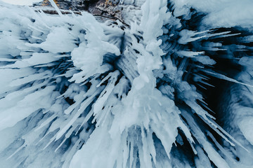 Ice caves with frozen water on Lake Baikal, Russia