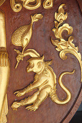 bas-relief representing a monkey (divinity ?) in a buddhist temple (Wat Pa Lelai) in Suphan Buri (Thailand)